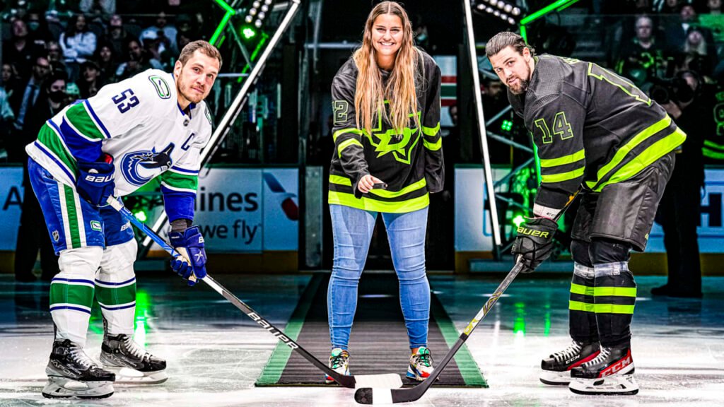 Women's sports pioneer Fuller drops puck at Stars game Women's sports pioneer Fuller drops puck at Stars game